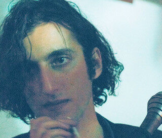 Promo shot of Andrew Kamel