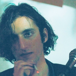 Promo shot of Andrew Kamel