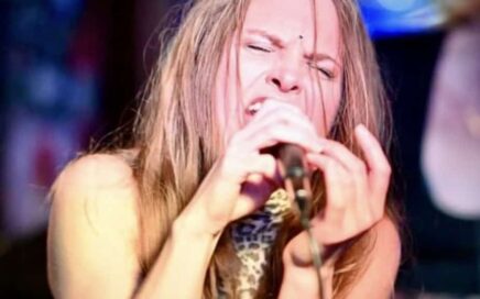 Photo of Tabitha singing