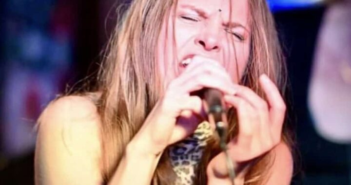 Photo of Tabitha singing